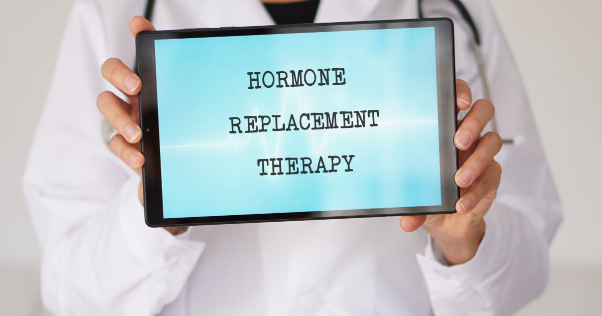Doctor holding tablet displaying Hormone Replacement Therapy in Mapleton, UT